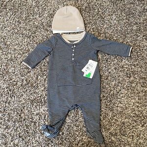 Brand new Baby footed onesie